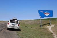 montana-border-welcome-sign-and-jeep-lawless-america-movie-2012-08-26 002-200w