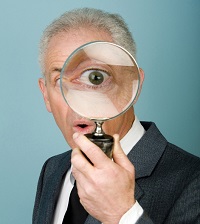 people-man-magnifying-glass-3500000-med0000875-cropped-200w